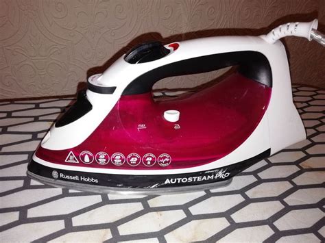 Russell Hobbs Autosteam Pro Iron and Ironing Board | Home appliances, Iron, Ironing board