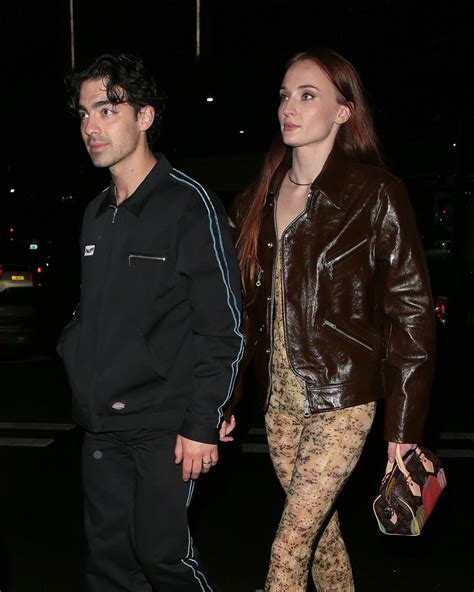 See Sophie Turner Wear A Semi Sheer Floral Jumpsuit At A Jonas Brothers Concert