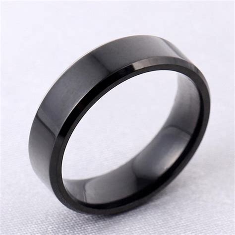 Anillo negro de acero inoxidable para hombres y mujeres Etsy España