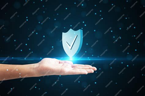 Premium Photo Close Up Of Male Hand Holding Creative Antivirus Shield