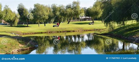 Golf Course By A Pond At An Exclusive Park Like Setting Stock Image