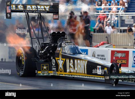 Tony Schumacher Races Down The Track In His Us Army Top Fuel Dragster During The 2nd Round Of