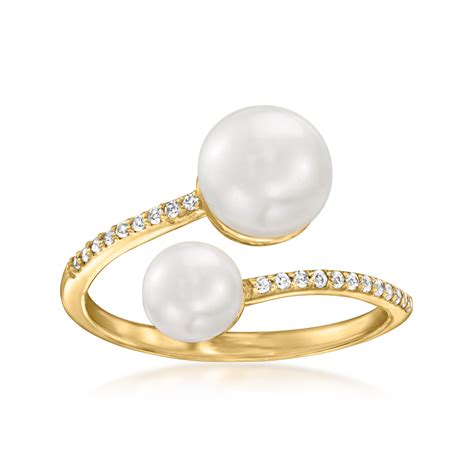 5 5 8mm Cultured Pearl And 10 Ct T W White Topaz Bypass Ring In 18kt