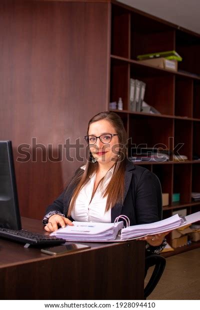 Portrait Female Office Worker Working On Stock Photo 1928094410