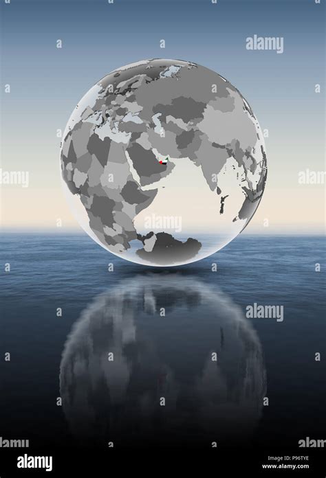 United Arab Emirates With Flag On Translucent Globe Above Water 3D