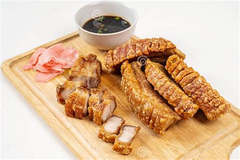 Deep Fried Crispy Streaky Pork Belly Thai And Chinese Food On Cutting