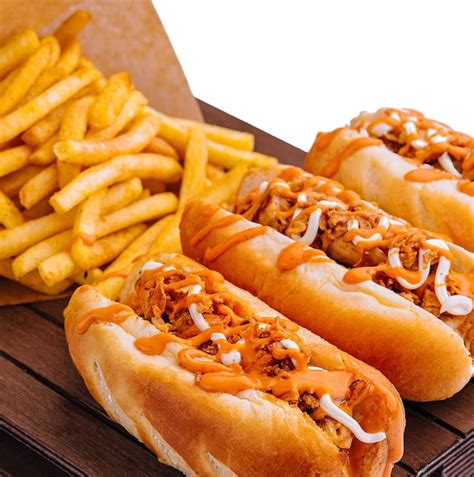 Premium Photo Hot Dogs And Fried Potatoes On Wooden Board