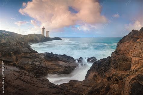 Petit Minou Lighthouse at sunset with red light , Brest , France View of Lighthouse of Petit ...