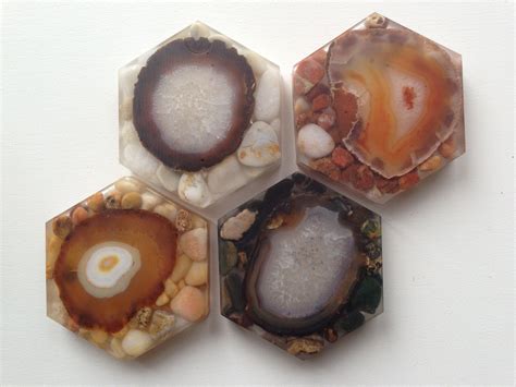 Four Different Types Of Agate And Shell Shapes On Top Of Each Other In Hexagons