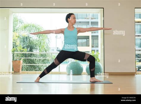 Yoga Class Studioasian Woman Master Doing Warrior Ii Posehealthly