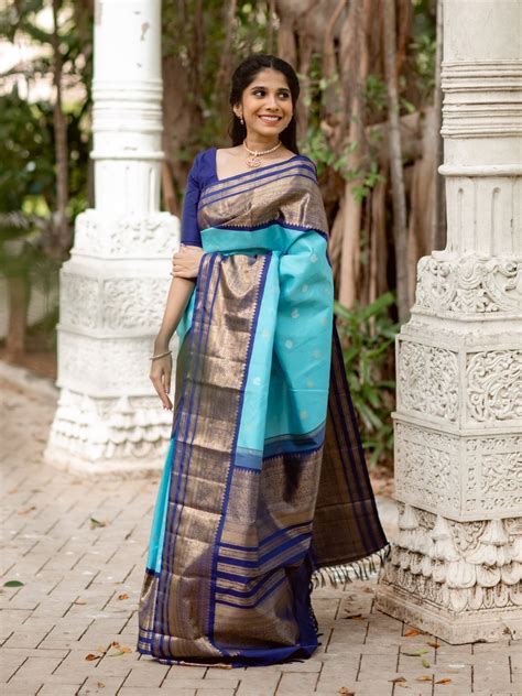 Light Blue Kanjeevaram Silk Saree With Navy Blue Border