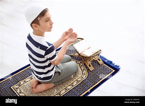 muslim boy praying  res stock photography  images alamy