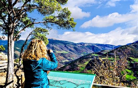 Premium Photo Curly Haired Blonde Woman In The Mountains Of The Ribes