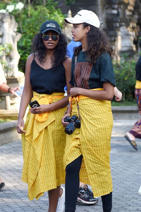 Malia and Sasha Obama Wear Bright Sarongs While Visiting a Temple in ...