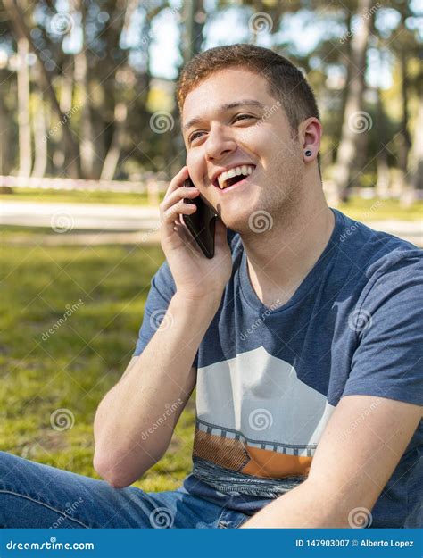 Teenager Smiling Talking on Mobile Phone Stock Image - Image of student