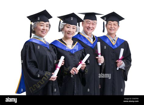 Senior students cheering for graduation Stock Photo - Alamy