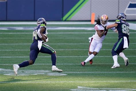 Russell Wilsons Throws Four Td Passes As The Seattle Seahawks Roll