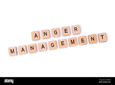 The Phrase ANGER MANAGEMENT Spelt With Wooden Letter Tiles Stock Photo