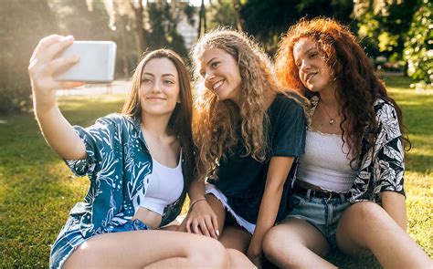 Three Young Friends Making A Selfie By Stocksy Contributor Marco