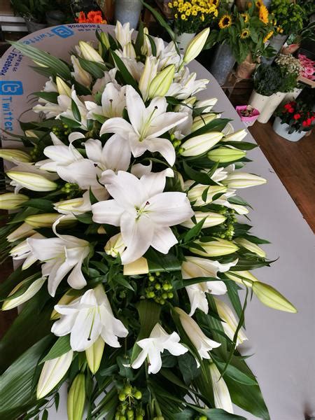 White Lily Casket Spray Funeral Flowers Bath