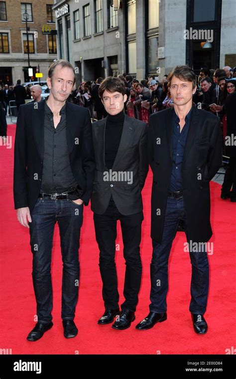 Suede Band Members Mat Osman Neil Codling And Brett Anderson Arriving