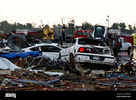 Damaged Cars Pile Up In Parking Lots In Joplin Missouri After A