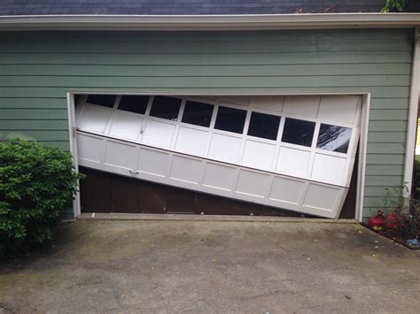 Door off track before | Garage doors, Garage door opener repair, Garage