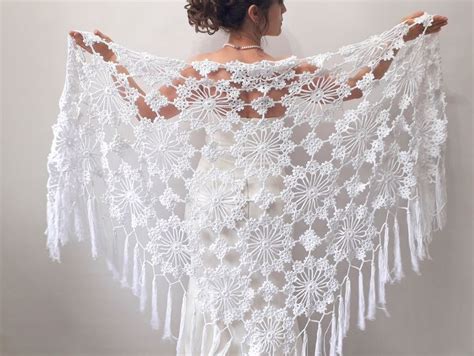 A Woman Wearing A White Crochet Shawl