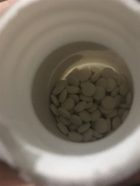 Freshly opened new pill bottle, 1 fourth full. : r/assholedesign
