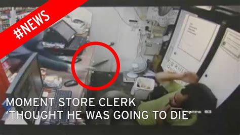 Footage Shows Shocking Moment Armed Robber Dives Over Shop Counter And