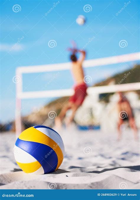 The Games Still Going on. a Beach Volleyball Game on a Sunny Day. Stock ...