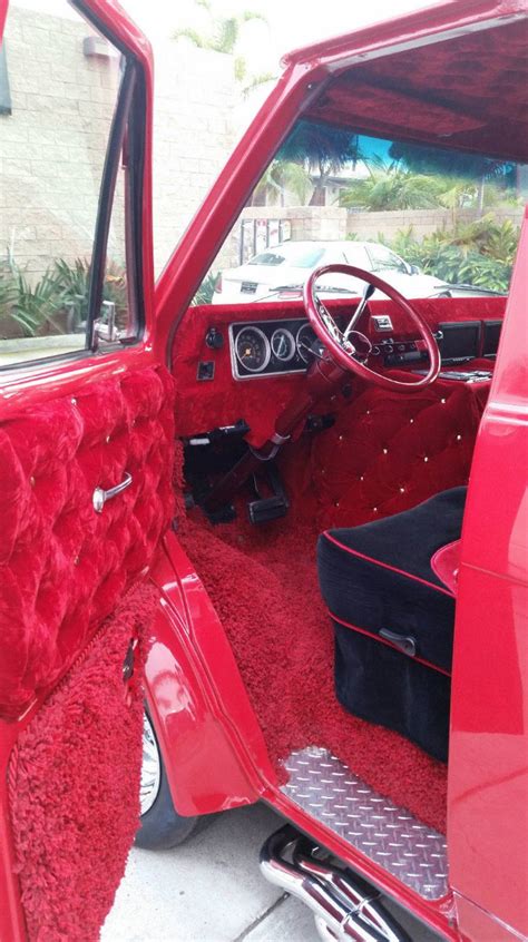 Vintage Red Car Interior with Carpeted Flooring