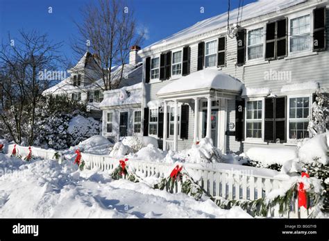 Snow covered New England house at Christmas in Falmouth, Cape Cod ...