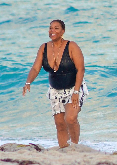 Queen Latifah, 53, shows off her curves in a black swimsuit on Miami ...