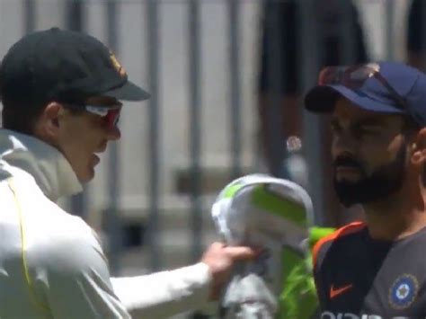 WATCH: This 'frosty' handshake between Virat Kohli and Tim Paine has ...