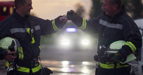 Portrait Of A Heroic Fireman In A Protective Suit Firefighter In Fire