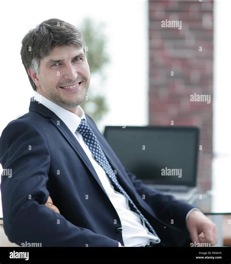 Senior Manager Sitting At The Desk Stock Photo Alamy