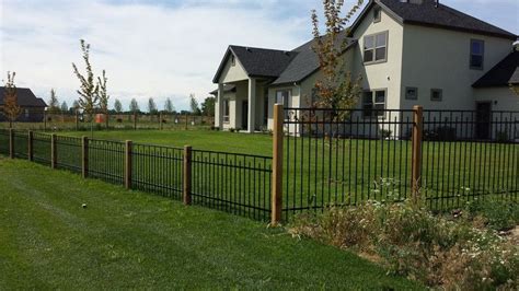 Frontier Fence Custom Iron Fencing Installation Services Boise Wood Post Iron Fence