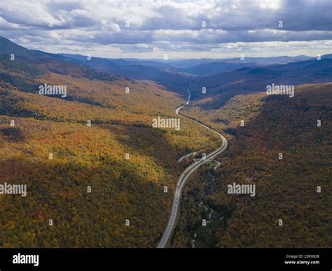 Franconia Notch with fall foliage aerial view including Profile Lake ...