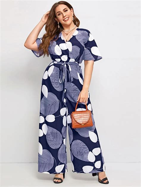 Plus Surplice Neck Self Belted Wide Leg Allover Print Jumpsuit Bunga