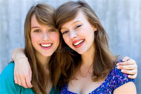 Two Women Hugging And Smiling Stock Photography - Image: 15631732