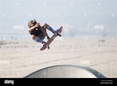 A skateboarder performing tricks at Venice Beach Skatepark, Santa ...