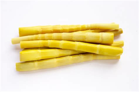 Premium Photo Preserved Bamboo Shoot In White Bowl On Yellow Background