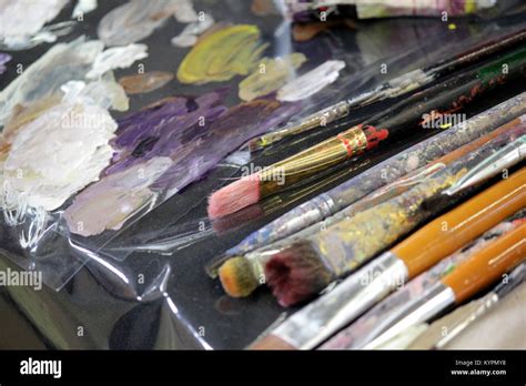 art materials artists paint brushes  palette stock photo alamy