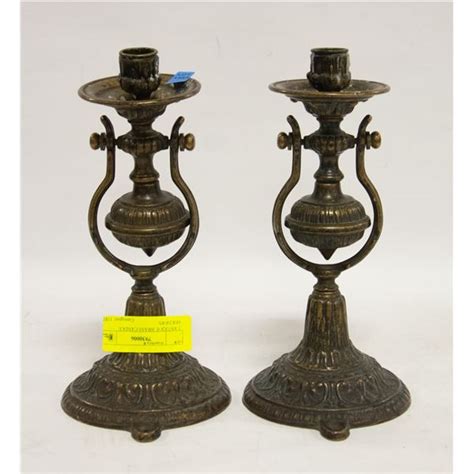 2 ANTIQUE BRASS CANDLE HOLDERS