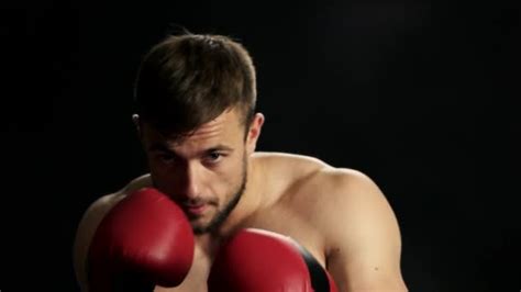 Shirtless kick boxer showing his punches. — Stock Video © Denisfilm ...