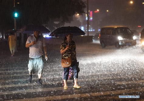 Heavy Rainstorm Sweeps Beijing Cn