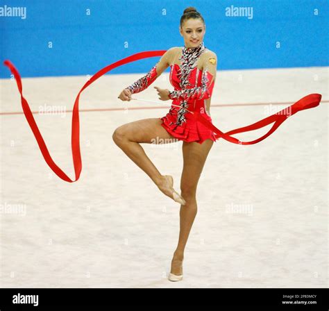 Evgeniya Kanaeva Of Russia Performs With A Ribbon During The Rhythmic Gymnastics World