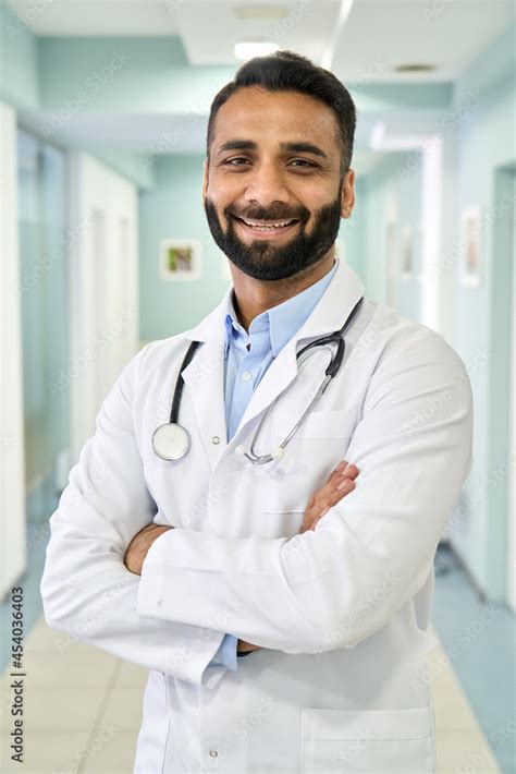 Smiling Happy Male Indian Latin Doctor Medical Worker Wearing White