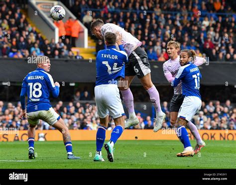 Dan Scarr 6 Of Plymouth Argyle Heads The Ball And Is Saved During The